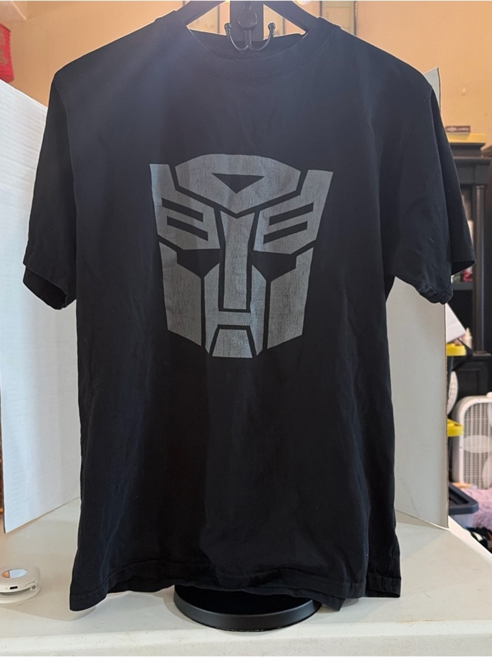 Source Unknown Black Tee with Silver Autobot Graphic